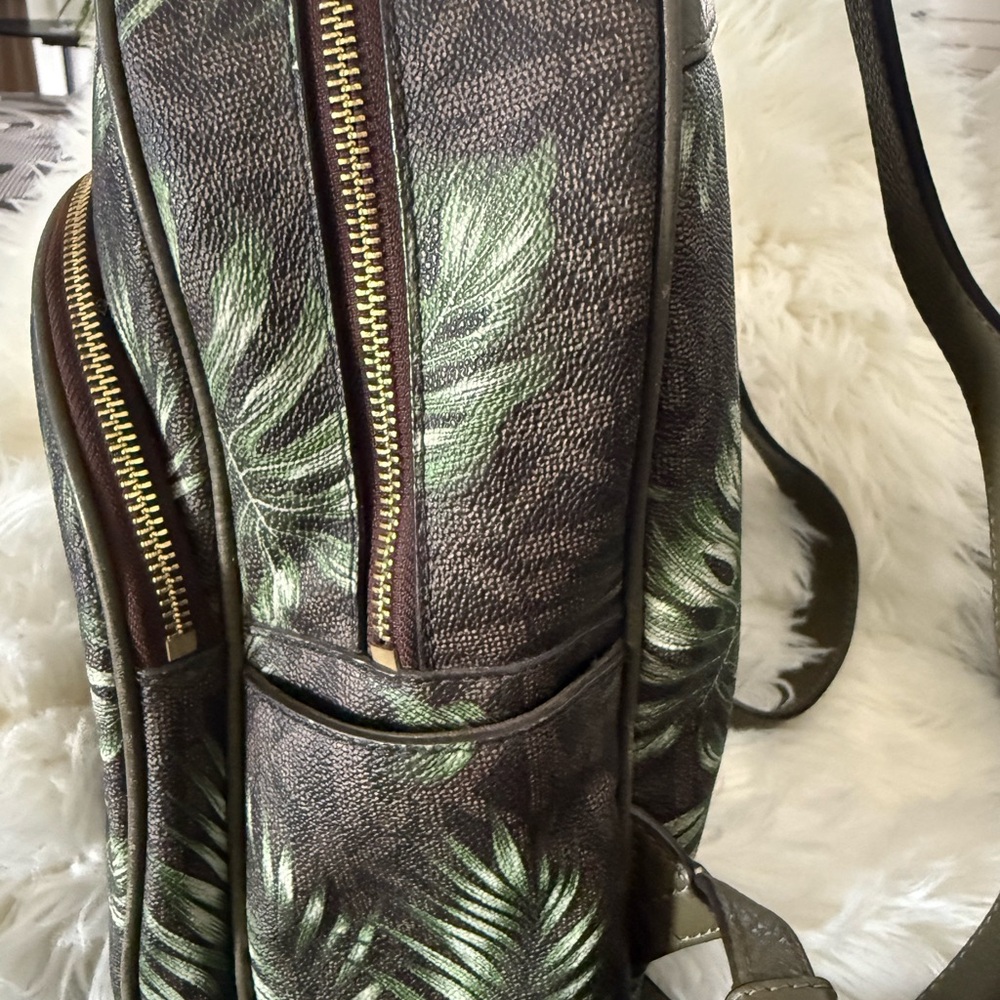 Michael Kors woman’s Backpack with Green Leaf Design.
Used good condition - Picture 5 of 5